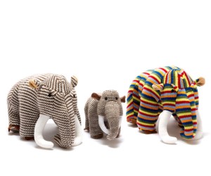 Knitted multi stripe woolly mammoth dinosaur soft toy
